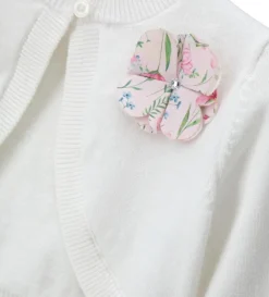 Cardigan con fiore