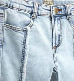 Jeans flare sfrangiati