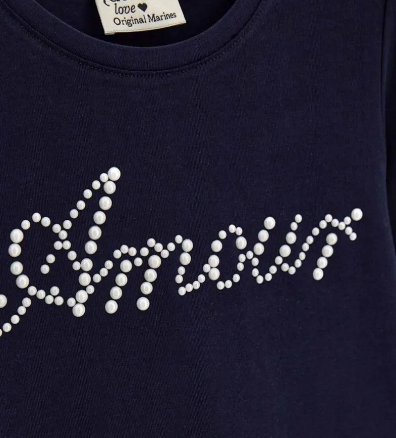 T-shirt blu con perle